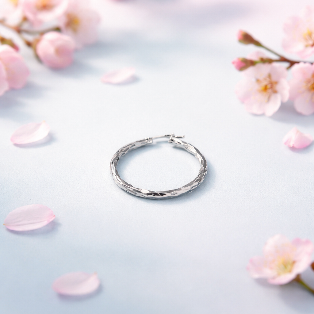 Sterling Silver .925 Twisted Diamond-Cut Hoop Earrings (30mm)